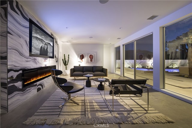7035 Sunny Vista Rd, Joshua Tree, CA 92252 - carpeted living area with a large fireplace