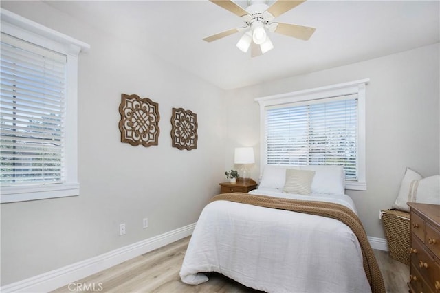 16 Vitale Ln, Lake Forest, CA 92610 - bedroom featuring wood finished floors, baseboards, and ceiling fan