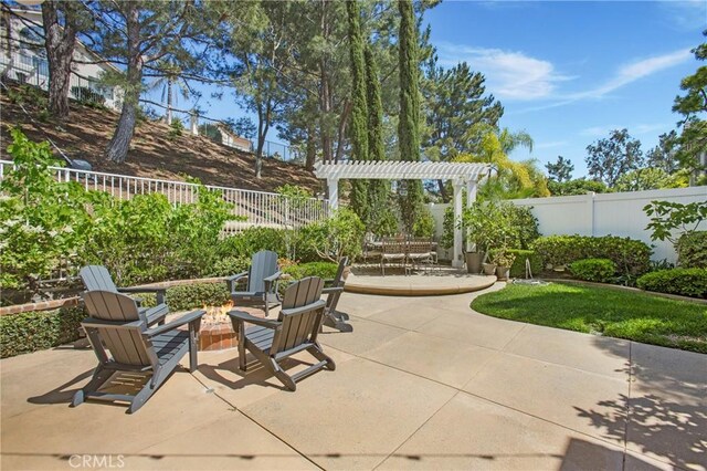 16 Vitale Ln, Lake Forest, CA 92610 - fenced backyard featuring a patio, a pergola, and an outdoor fire pit