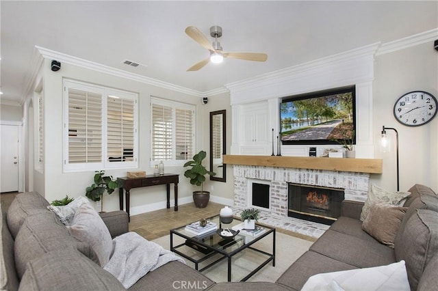 16 Vitale Ln, Lake Forest, CA 92610 - living room with ornamental molding, ceiling fan, a fireplace, and baseboards