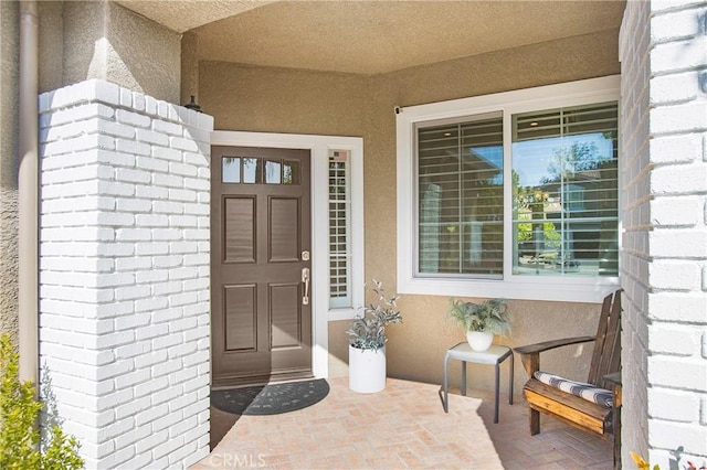 16 Vitale Ln, Lake Forest, CA 92610 - entrance to property featuring stucco siding and brick siding