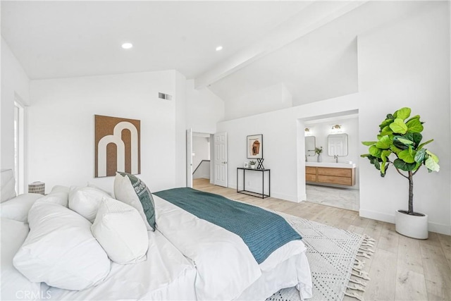 23 Santa Isabel, Rancho Santa Margarita, CA 92688 - bedroom with beam ceiling, light wood finished floors, ensuite bathroom, recessed lighting, and baseboards