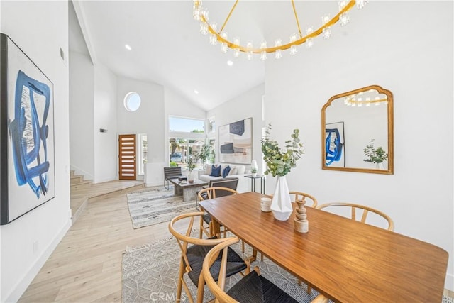 23 Santa Isabel, Rancho Santa Margarita, CA 92688 - dining space featuring high vaulted ceiling, wood finished floors, baseboards, stairs, and recessed lighting