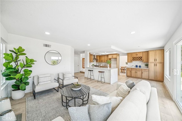 23 Santa Isabel, Rancho Santa Margarita, CA 92688 - living room featuring light wood finished floors, recessed lighting, and baseboards