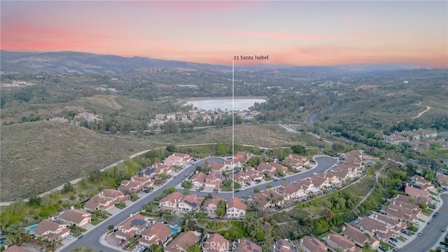 23 Santa Isabel, Rancho Santa Margarita, CA 92688 - aerial overview of property's location with nearby suburban area and a mountain backdrop
