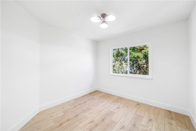 23 Santa Isabel, Rancho Santa Margarita, CA 92688 - unfurnished room featuring baseboards and light wood finished floors