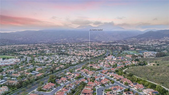 23 Santa Isabel, Rancho Santa Margarita, CA 92688 - aerial overview of property's location featuring mountains and nearby suburban area