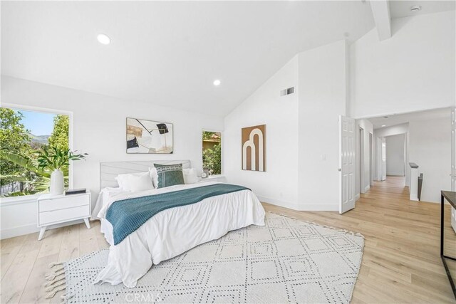 23 Santa Isabel, Rancho Santa Margarita, CA 92688 - bedroom with multiple windows, high vaulted ceiling, light wood-style flooring, recessed lighting, and beam ceiling
