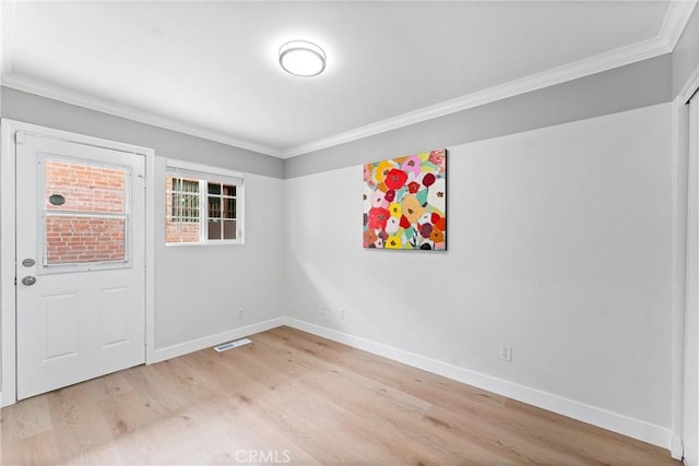 1960 Chariton St, Los Angeles, CA 90034 - unfurnished room with crown molding, light wood-style flooring, and baseboards