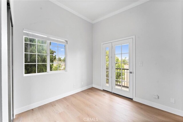 1960 Chariton St, Los Angeles, CA 90034 - spare room with ornamental molding, wood finished floors, and baseboards