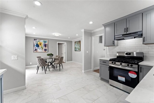 1960 Chariton St, Los Angeles, CA 90034 - kitchen featuring stainless steel range with gas cooktop, under cabinet range hood, crown molding, gray cabinets, and recessed lighting