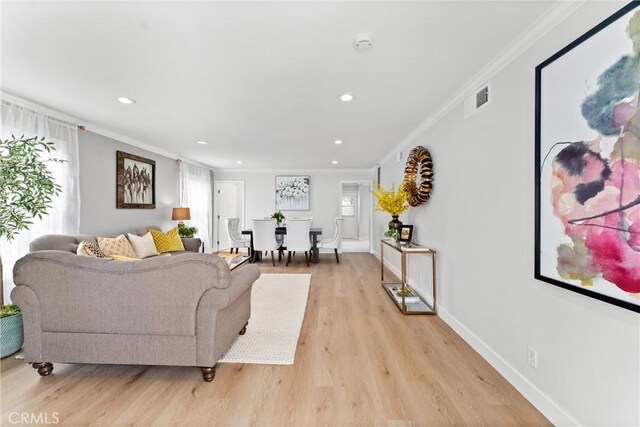 1960 Chariton St, Los Angeles, CA 90034 - living room featuring crown molding, light wood-style flooring, plenty of natural light, recessed lighting, and baseboards
