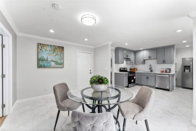 1960 Chariton St, Los Angeles, CA 90034 - dining area with light marble finish floors, recessed lighting, baseboards, and crown molding