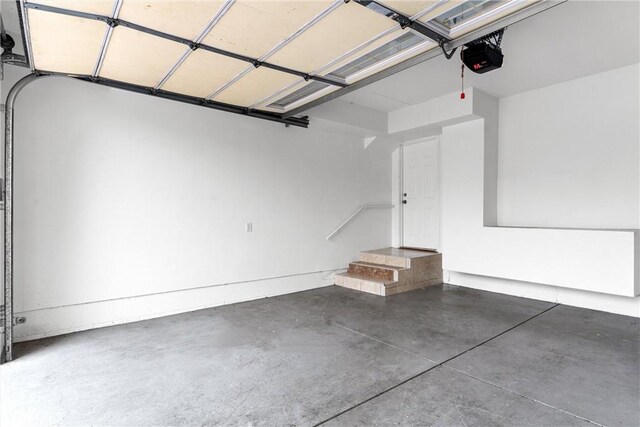 1960 Chariton St, Los Angeles, CA 90034 - garage featuring a garage door opener