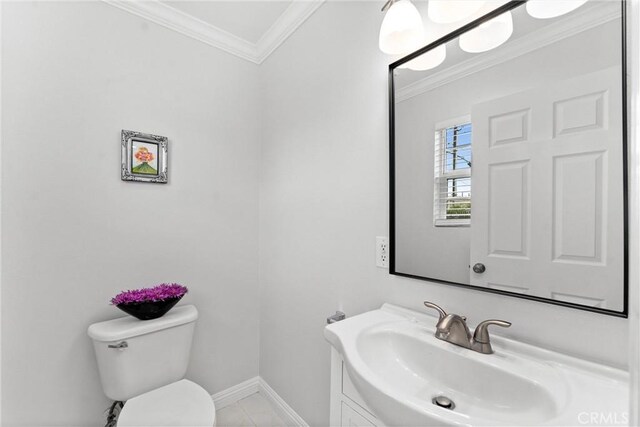 1960 Chariton St, Los Angeles, CA 90034 - bathroom with toilet, vanity, ornamental molding, baseboards, and tile patterned flooring