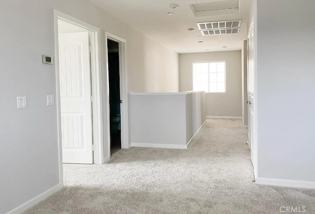 24927 Gulfstream Ln, Moreno Valley, CA 92553 - corridor featuring carpet floors, baseboards, and an upstairs landing
