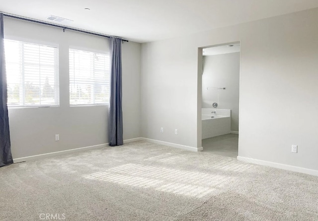 24927 Gulfstream Ln, Moreno Valley, CA 92553 - unfurnished bedroom with carpet floors, multiple windows, and baseboards
