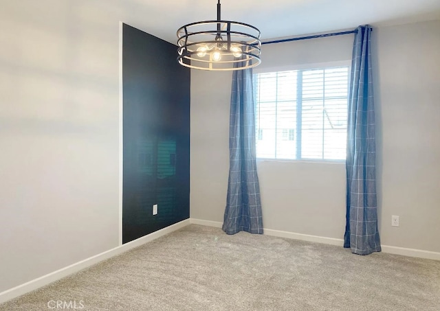 24927 Gulfstream Ln, Moreno Valley, CA 92553 - spare room featuring a chandelier, carpet, and baseboards