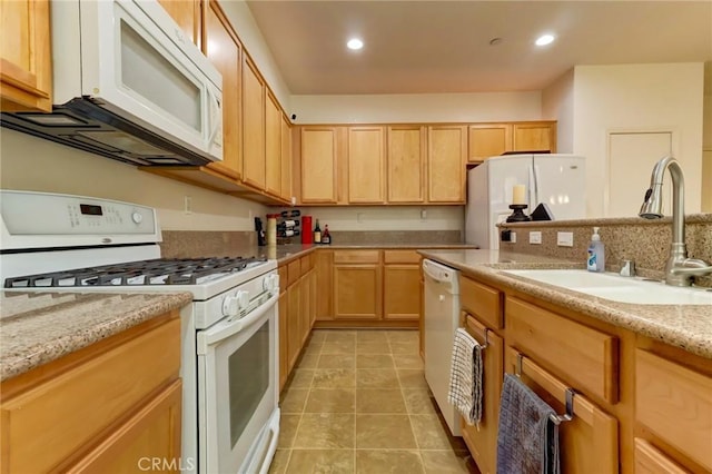 16710 Nicklaus Dr Unit 73, Rancho Cascades, CA 91342 - kitchen featuring white appliances, a sink, light brown cabinets, light tile patterned floors, and recessed lighting