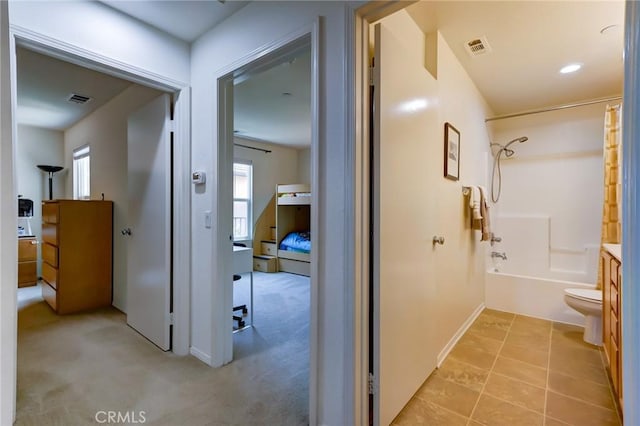 16710 Nicklaus Dr Unit 73, Rancho Cascades, CA 91342 - corridor with plenty of natural light, baseboards, and light colored carpet