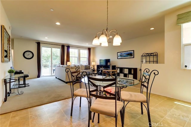 16710 Nicklaus Dr Unit 73, Rancho Cascades, CA 91342 - dining area with light colored carpet, recessed lighting, a chandelier, and light tile patterned floors