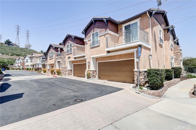 16710 Nicklaus Dr Unit 73, Rancho Cascades, CA 91342 - view of asphalt road with a residential view