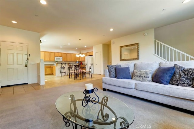 16710 Nicklaus Dr Unit 73, Rancho Cascades, CA 91342 - living area with recessed lighting, light carpet, a chandelier, and stairs