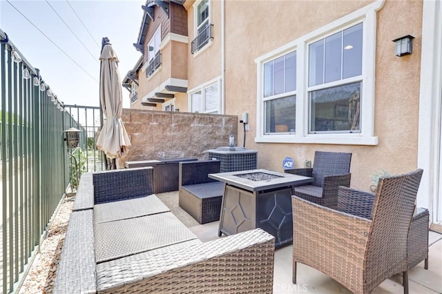 16710 Nicklaus Dr Unit 73, Rancho Cascades, CA 91342 - view of patio with a fire pit and cooling unit