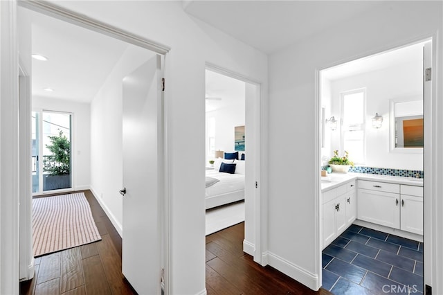 420 34th St, Manhattan Beach, CA 90266 - hallway with dark wood-style flooring and baseboards