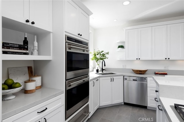 420 34th St, Manhattan Beach, CA 90266 - kitchen featuring stainless steel appliances, open shelves, white cabinets, light countertops, and recessed lighting
