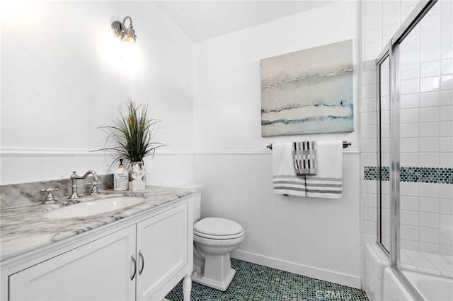 420 34th St, Manhattan Beach, CA 90266 - full bath featuring combined bath / shower with glass door, vanity, a wainscoted wall, and tile patterned flooring