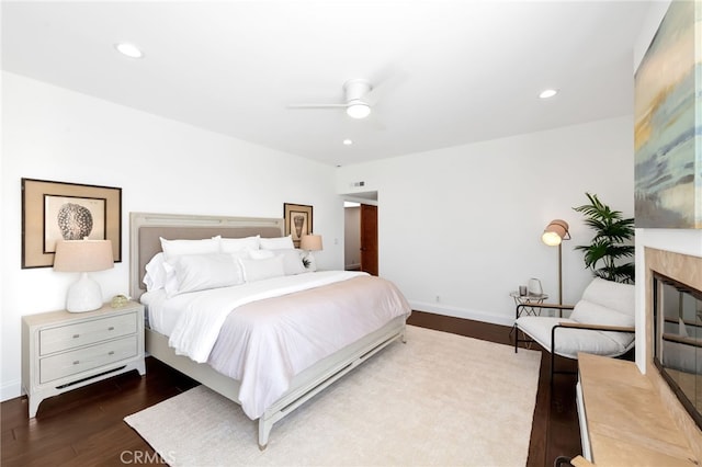 420 34th St, Manhattan Beach, CA 90266 - bedroom with dark wood-style flooring, a premium fireplace, recessed lighting, and a ceiling fan