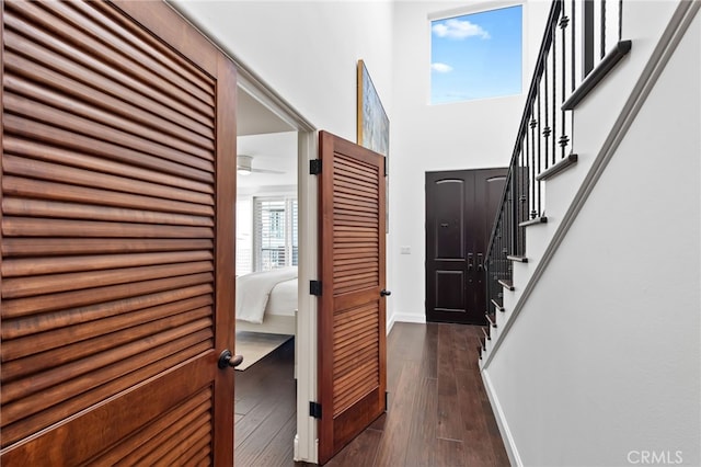 420 34th St, Manhattan Beach, CA 90266 - hall featuring stairs, dark wood-style flooring, and a towering ceiling