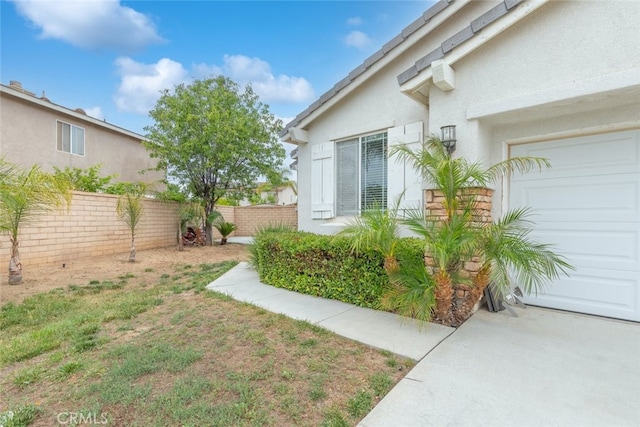 26146 Deer Run St, Menifee, CA 92584 - view of yard with a garage