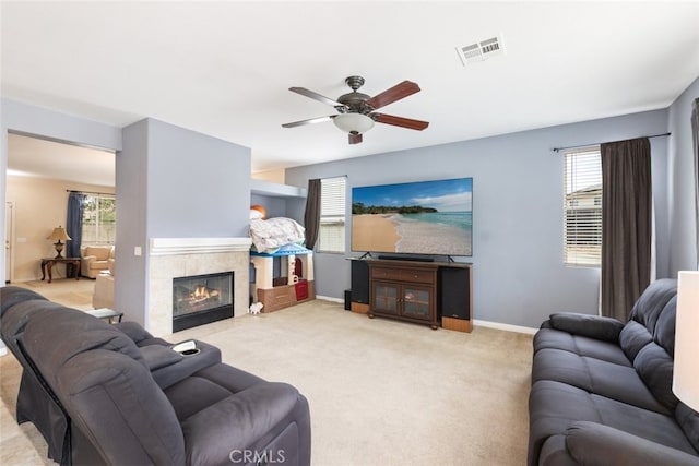 26146 Deer Run St, Menifee, CA 92584 - living area with a ceiling fan, light carpet, healthy amount of natural light, and baseboards