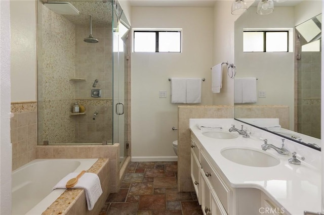 330 Cordova St Unit 322, Pasadena, CA 91101 - bathroom featuring a stall shower, a garden tub, healthy amount of natural light, and stone finish flooring