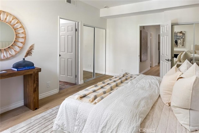 330 Cordova St Unit 322, Pasadena, CA 91101 - bedroom featuring wood finished floors and baseboards