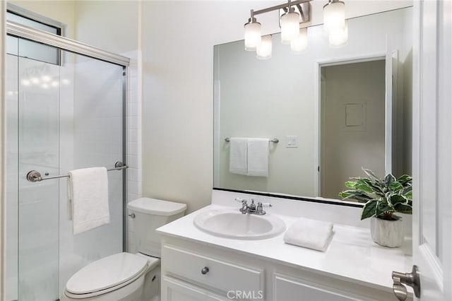 330 Cordova St Unit 322, Pasadena, CA 91101 - bathroom featuring toilet, vanity, and a stall shower
