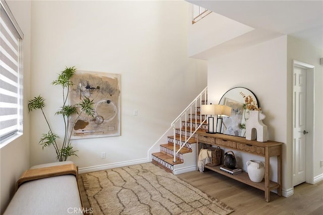 330 Cordova St Unit 322, Pasadena, CA 91101 - stairway featuring wood finished floors and baseboards