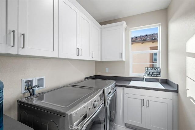 56 Claudius Ct, Irvine, CA 92618 - laundry area featuring washing machine and dryer and cabinet space