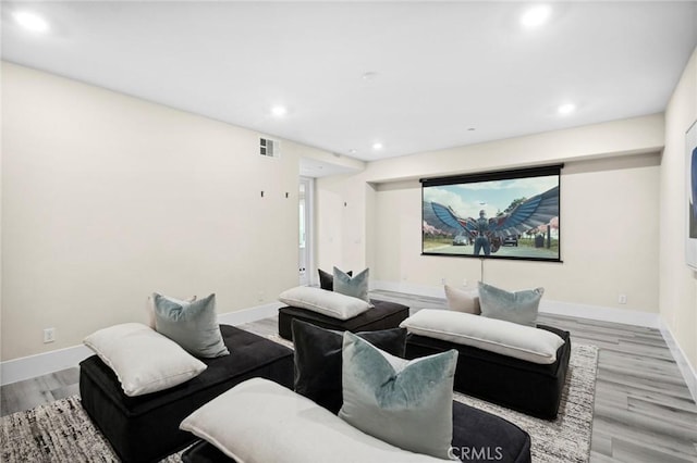 56 Claudius Ct, Irvine, CA 92618 - cinema room featuring wood finished floors, recessed lighting, and baseboards