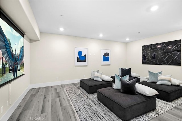 56 Claudius Ct, Irvine, CA 92618 - home theater room featuring wood finished floors, recessed lighting, and baseboards