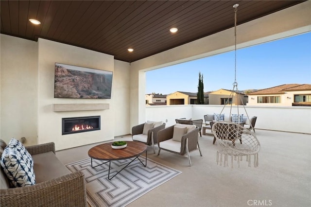 56 Claudius Ct, Irvine, CA 92618 - view of patio with an outdoor living space with a fireplace and a residential view