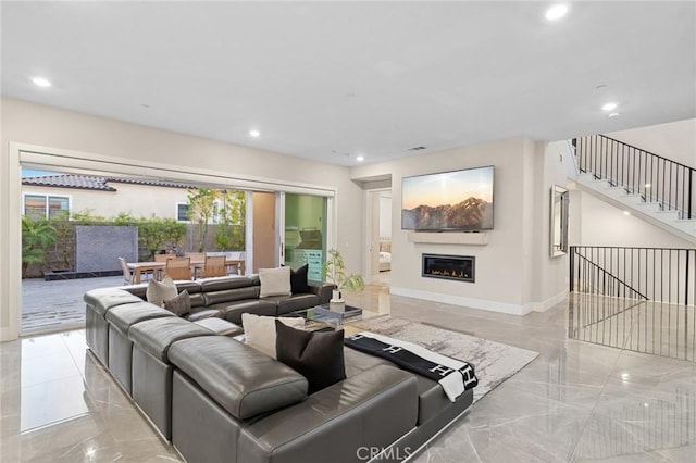 56 Claudius Ct, Irvine, CA 92618 - living area featuring light marble finish floors, baseboards, recessed lighting, plenty of natural light, and stairway