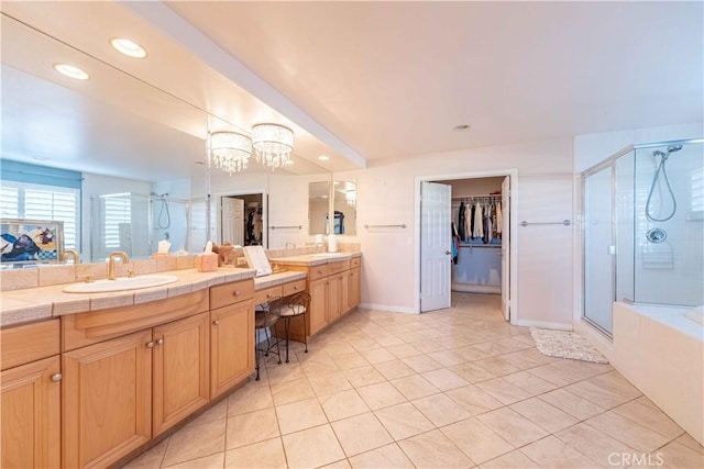 668 Corte Sol, Camarillo, CA 93010 - bathroom with a stall shower, a spacious closet, tile patterned floors, vanity, and recessed lighting