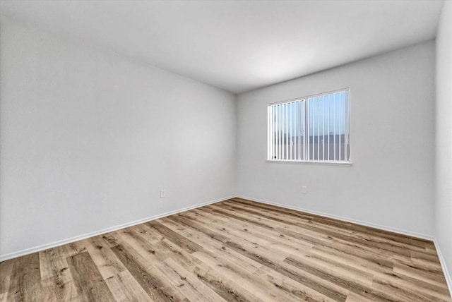 1036 W Gilman St, Banning, CA 92220 - spare room with wood finished floors and baseboards