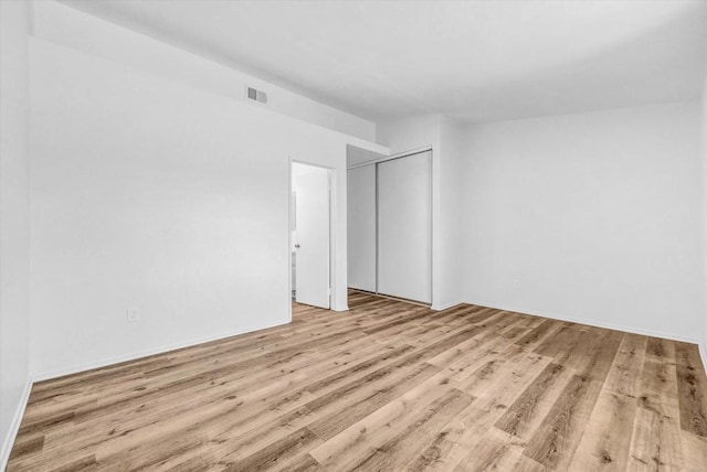 1036 W Gilman St, Banning, CA 92220 - spare room featuring wood finished floors