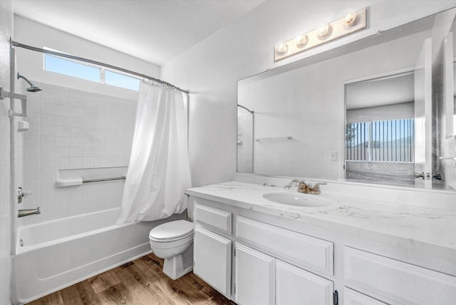 1036 W Gilman St, Banning, CA 92220 - bathroom with shower / bathtub combination with curtain, vanity, and wood finished floors