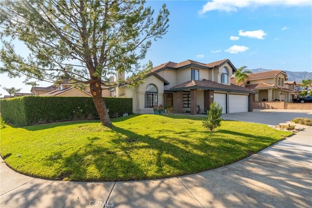 10880 Colusa St, Rancho Cucamonga, CA 91701 - mediterranean / spanish-style home with concrete driveway and stucco siding