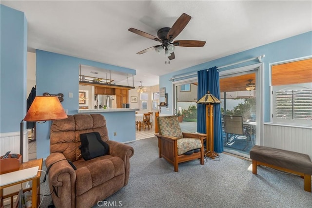 10880 Colusa St, Rancho Cucamonga, CA 91701 - carpeted living room with a ceiling fan and wainscoting